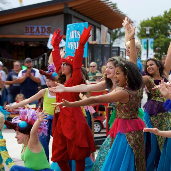 Arts A'Fair performers smiling and bowing