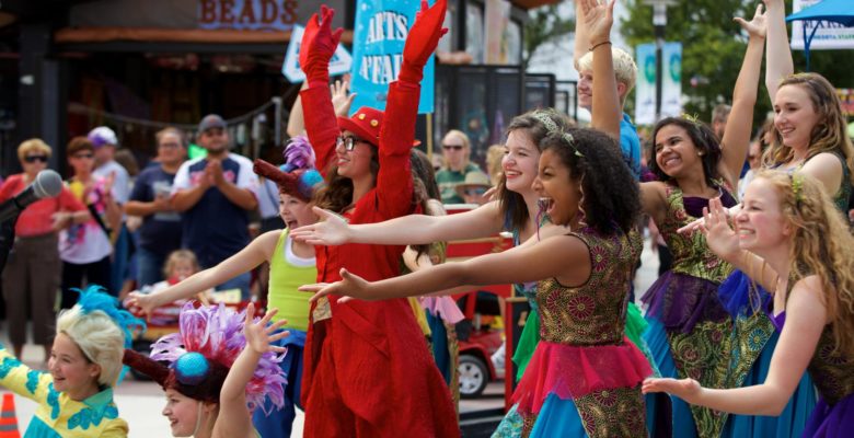 Arts A'Fair performers smiling and bowing