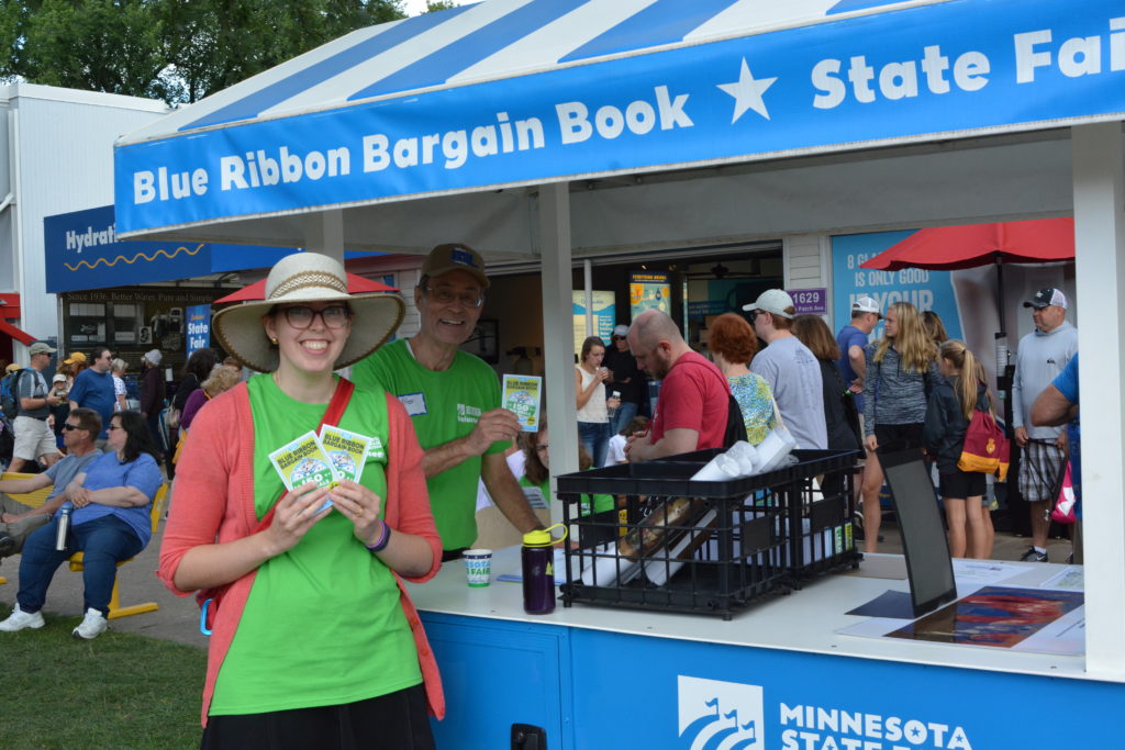 Volunteers selling Blue Ribbon Bargain Books