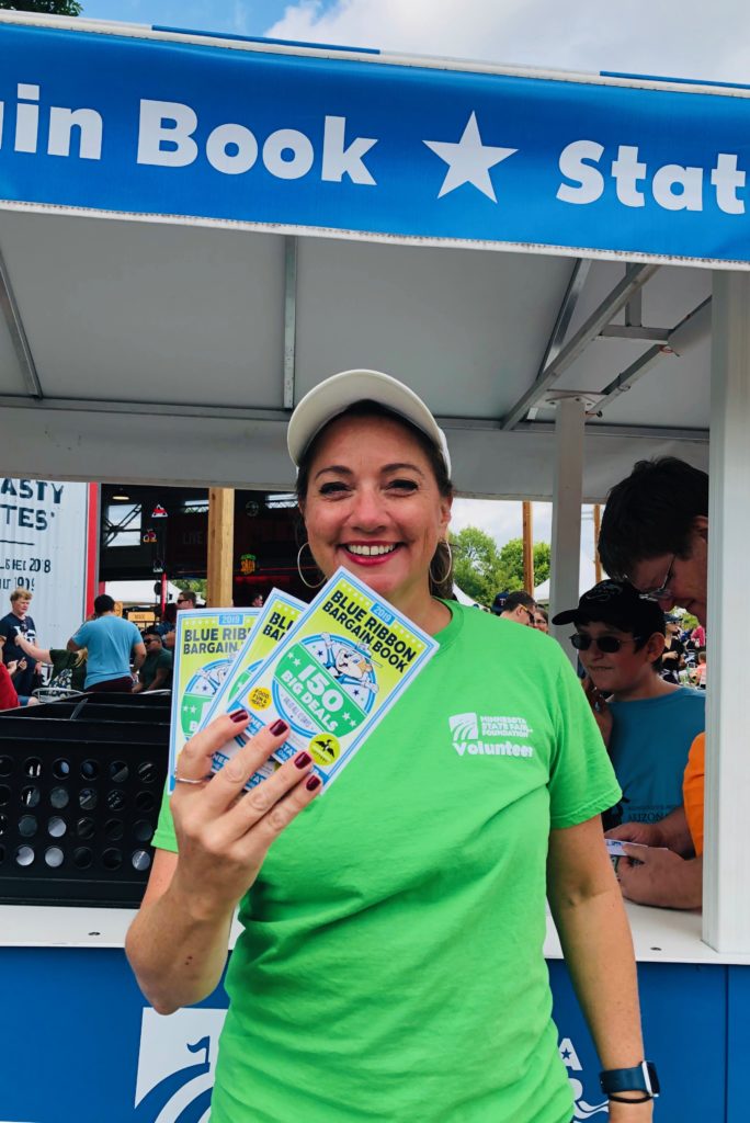 Volunteer selling Blue Ribbon Bargain Books