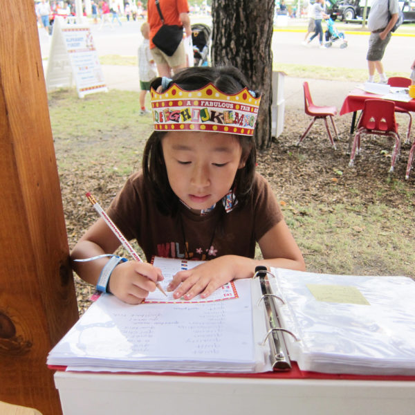 Little Girl wearing Alphabet Forest crown