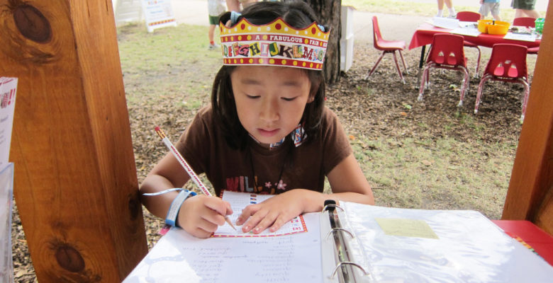 Little Girl wearing Alphabet Forest crown