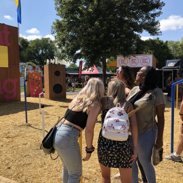 Friends singing together at Giant Sing Along